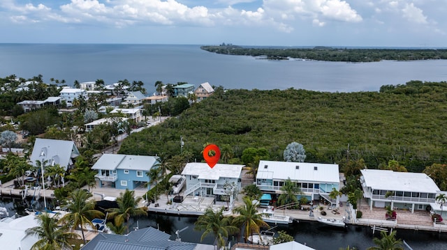 25 N Blackwater Ln, Key Largo, FL 33037 - aerial perspective of suburban area with a large body of water