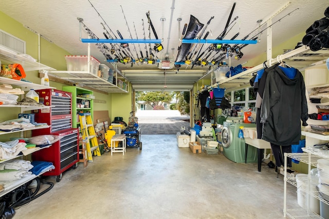 garage with washer and dryer