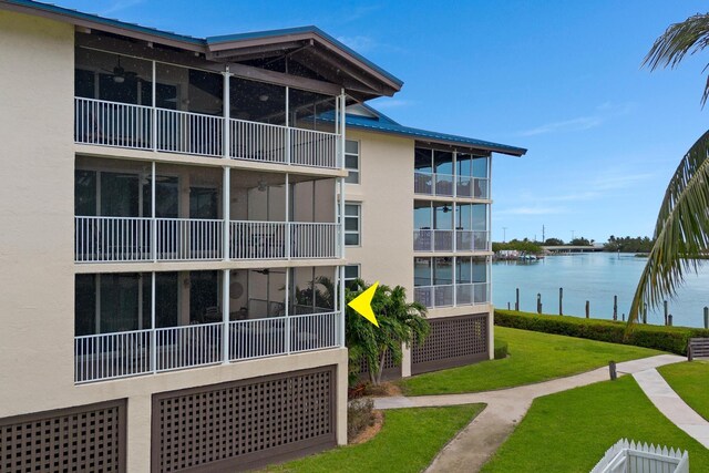 view of property with a water view