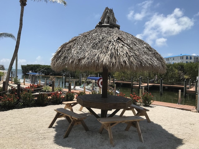 500 Burton Dr Unit 3406, Tavernier, FL 33070 - view of property's community featuring a water view and a boat dock