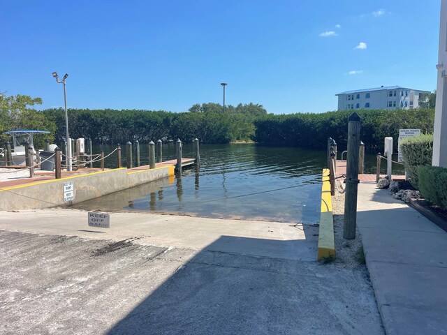 view of dock with a water view