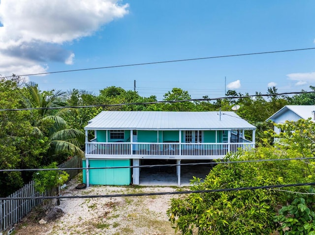 view of front of house featuring a carport