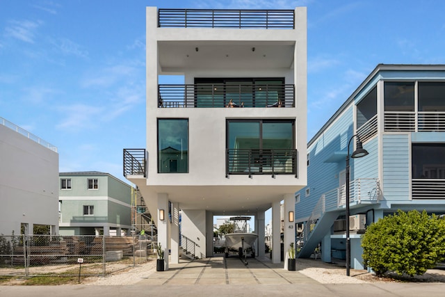 view of front facade with a carport