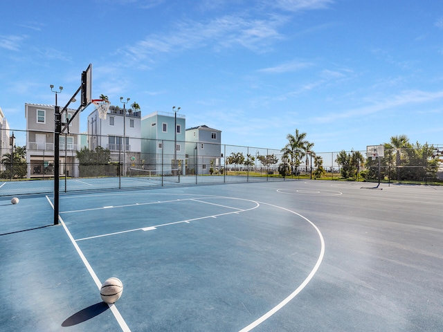 view of sport court with tennis court