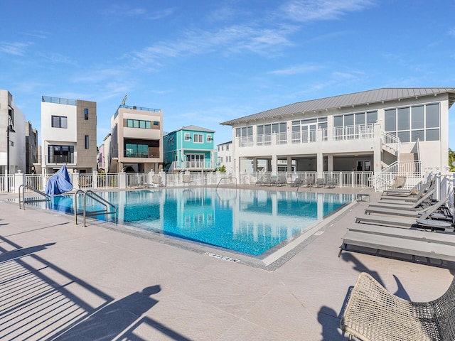 view of swimming pool featuring a patio