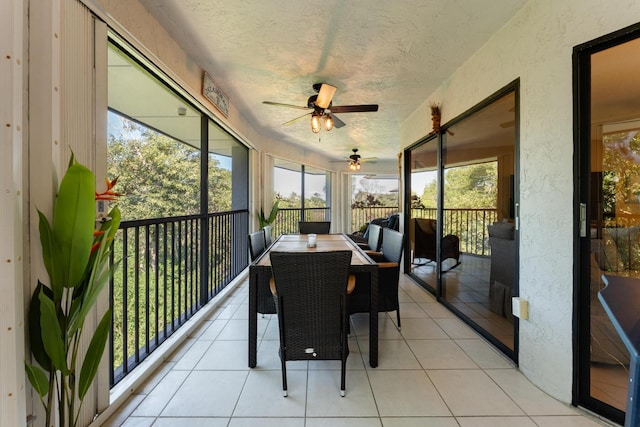 sunroom / solarium with ceiling fan