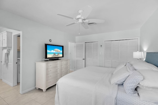 661 12th St, Key Colony, FL 33051 - bedroom with two closets, light tile patterned floors, and a ceiling fan