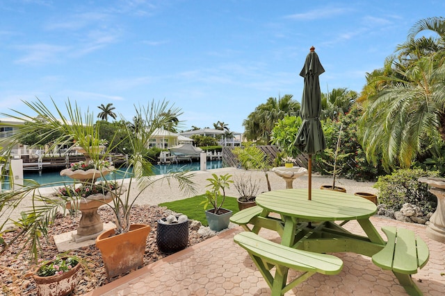 661 12th St, Key Colony, FL 33051 - view of patio with a water view