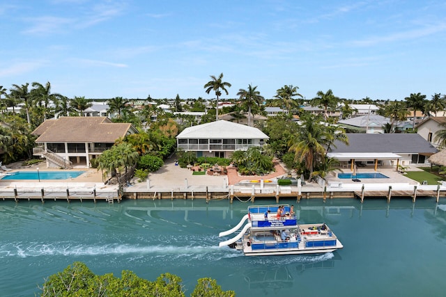 661 12th St, Key Colony, FL 33051 - aerial perspective of suburban area featuring a large body of water