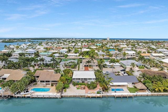 661 12th St, Key Colony, FL 33051 - aerial perspective of suburban area with a pool area and a nearby body of water
