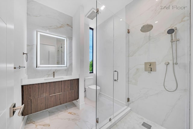 16 Seaside Ave, Key Largo, FL 33037 - full bath featuring a marble finish shower, vanity, toilet, and marble tiled floors