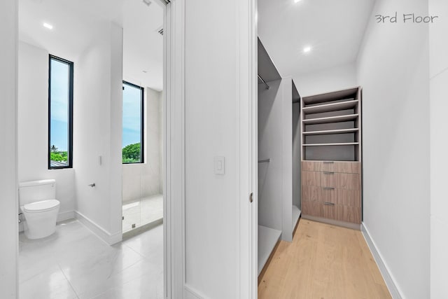 16 Seaside Ave, Key Largo, FL 33037 - walk in closet with light wood-type flooring