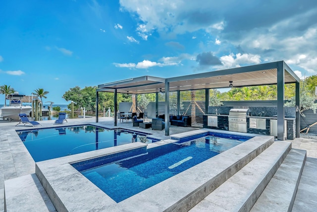 16 Seaside Ave, Key Largo, FL 33037 - view of swimming pool featuring an outdoor hangout area, a patio area, ceiling fan, and a pool with connected hot tub