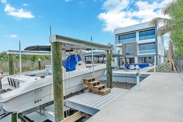 16 Seaside Ave, Key Largo, FL 33037 - dock area featuring boat lift