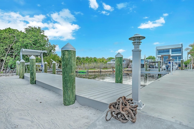 16 Seaside Ave, Key Largo, FL 33037 - view of home's community with a dock