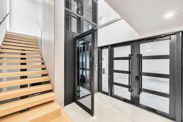 16 Seaside Ave, Key Largo, FL 33037 - staircase with french doors