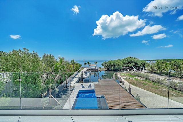 16 Seaside Ave, Key Largo, FL 33037 - view of tennis court with a water view