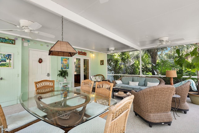 interior space featuring ceiling fan and an outdoor hangout area