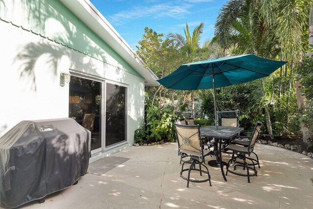 view of patio featuring a grill