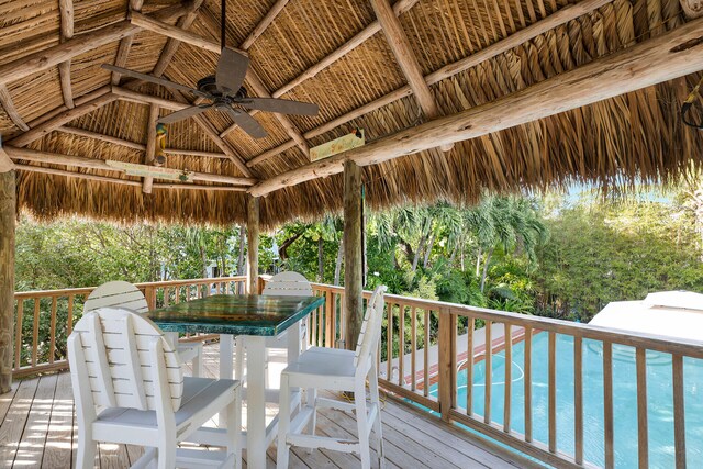 deck featuring a gazebo and ceiling fan