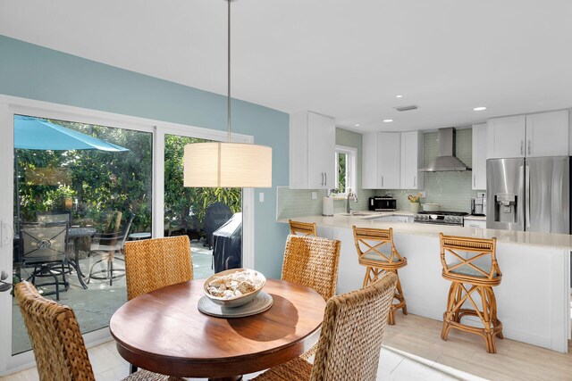 dining room featuring sink