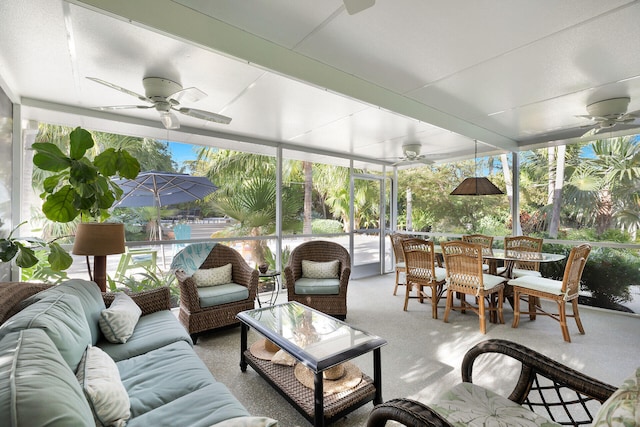 sunroom / solarium with ceiling fan and plenty of natural light