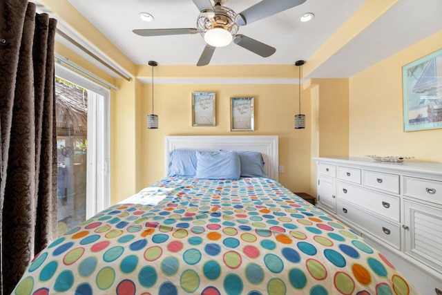 bedroom with ceiling fan and access to exterior