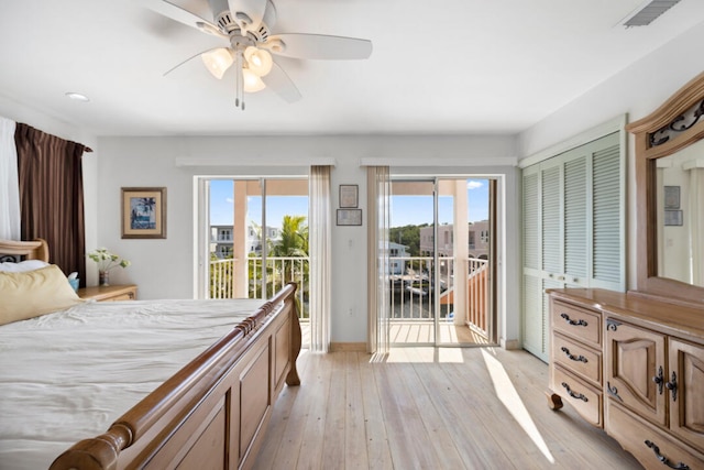 bedroom featuring ceiling fan, access to outside, and light wood-type flooring