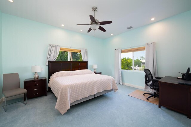 carpeted bedroom with ceiling fan