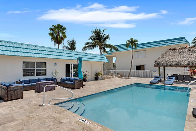 view of swimming pool with a gazebo, a pergola, an outdoor hangout area, and a patio