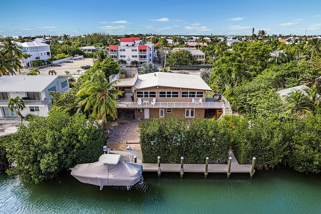 drone / aerial view featuring a water view