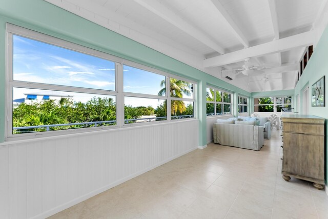 laundry area with a wealth of natural light and ceiling fan