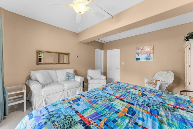 bedroom featuring tile patterned flooring and ceiling fan