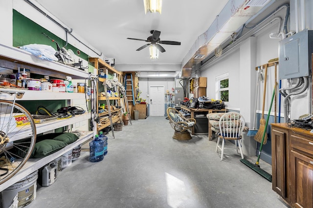 garage with a workshop area and ceiling fan