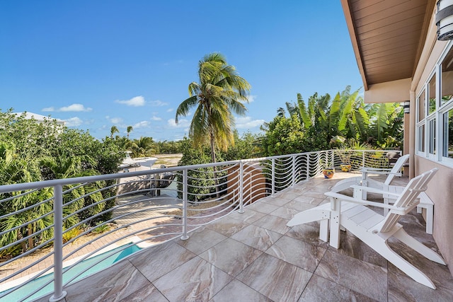 view of patio / terrace featuring a balcony