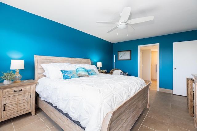 bedroom featuring tile patterned floors and ceiling fan