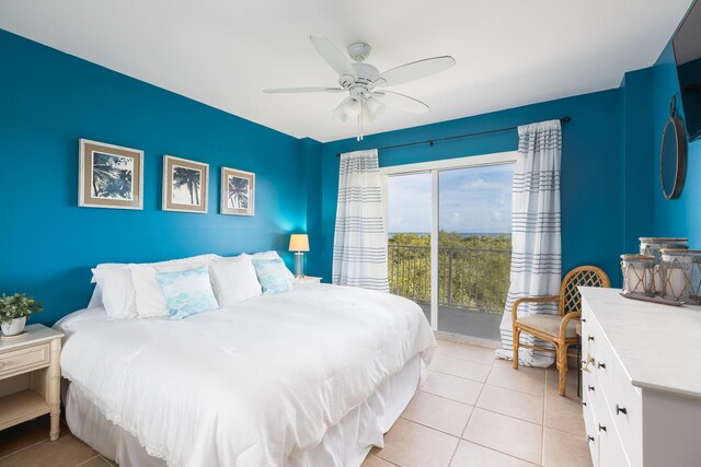 tiled bedroom with access to outside and ceiling fan