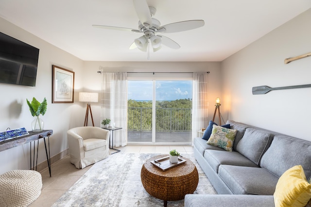 tiled living room featuring ceiling fan