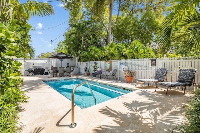 1203 Newton St Unit 2, Key West, FL 33040 - view of swimming pool featuring a patio, a fenced backyard, and outdoor dining area