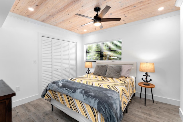 1610 Von Phister St, Key West, FL 33040 - bedroom with wood finished floors, crown molding, a closet, baseboards, and wood ceiling