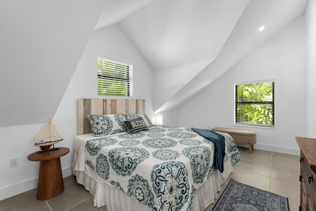 1610 Von Phister St, Key West, FL 33040 - bedroom featuring vaulted ceiling, tile patterned flooring, and baseboards