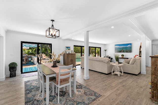 1610 Von Phister St, Key West, FL 33040 - dining space featuring ornamental molding, light wood finished floors, a chandelier, recessed lighting, and baseboards