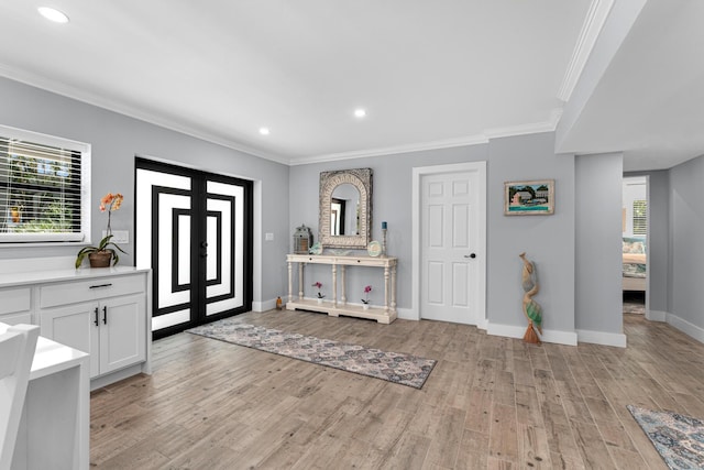 1610 Von Phister St, Key West, FL 33040 - foyer entrance with light wood-type flooring, crown molding, recessed lighting, and baseboards