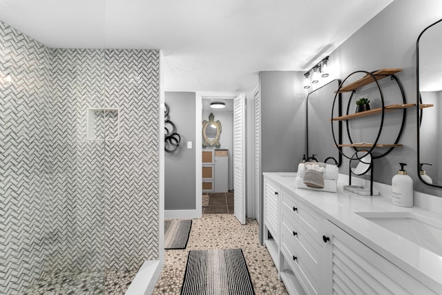 1610 Von Phister St, Key West, FL 33040 - bathroom featuring double vanity, tiled shower, and a closet