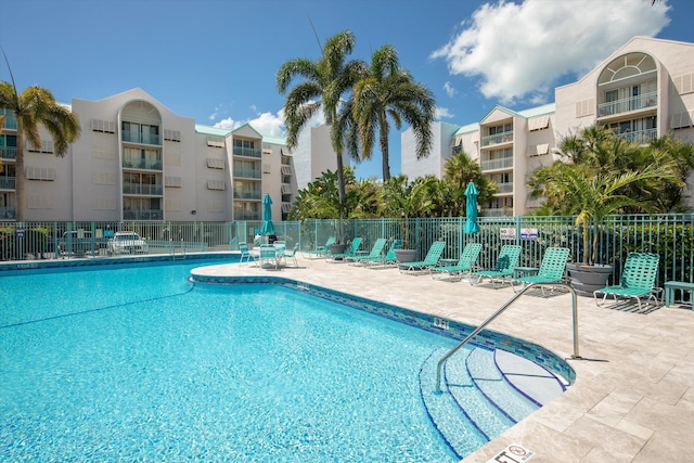 3635 Seaside Dr Unit 314, Key West, FL 33040 - community pool featuring a patio area and fence