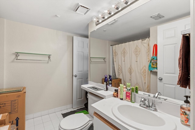3635 Seaside Dr Unit 314, Key West, FL 33040 - bathroom featuring toilet, vanity, tile patterned flooring, and visible vents
