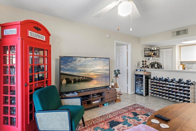 3635 Seaside Dr Unit 314, Key West, FL 33040 - tiled living area with visible vents, ceiling fan, and wine cooler