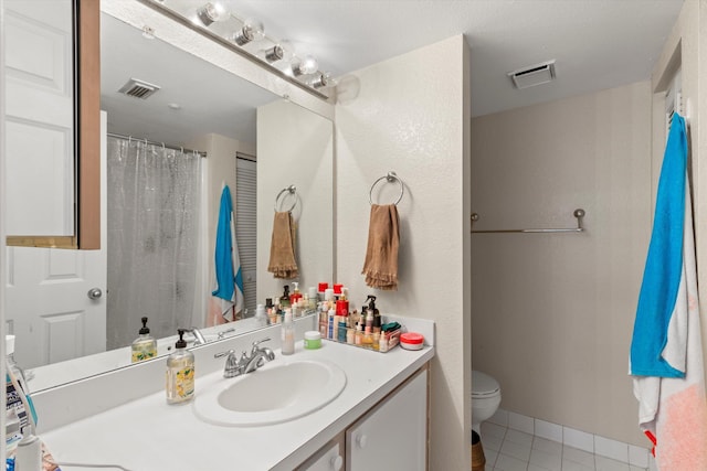 3635 Seaside Dr Unit 314, Key West, FL 33040 - full bathroom with tile patterned flooring, vanity, visible vents, and toilet