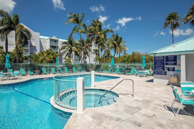 3635 Seaside Dr Unit 314, Key West, FL 33040 - community pool featuring fence, a patio area, and a community hot tub