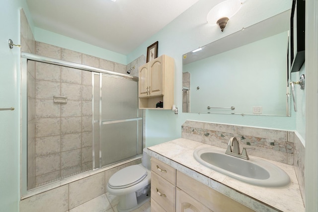 full bathroom with tile patterned flooring, backsplash, bath / shower combo with glass door, vanity, and toilet